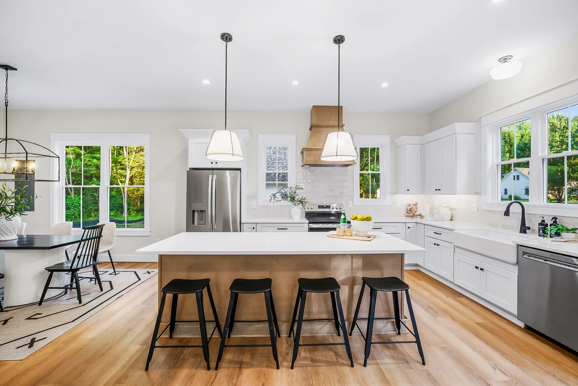 Custom kitchen — island with copper range hood