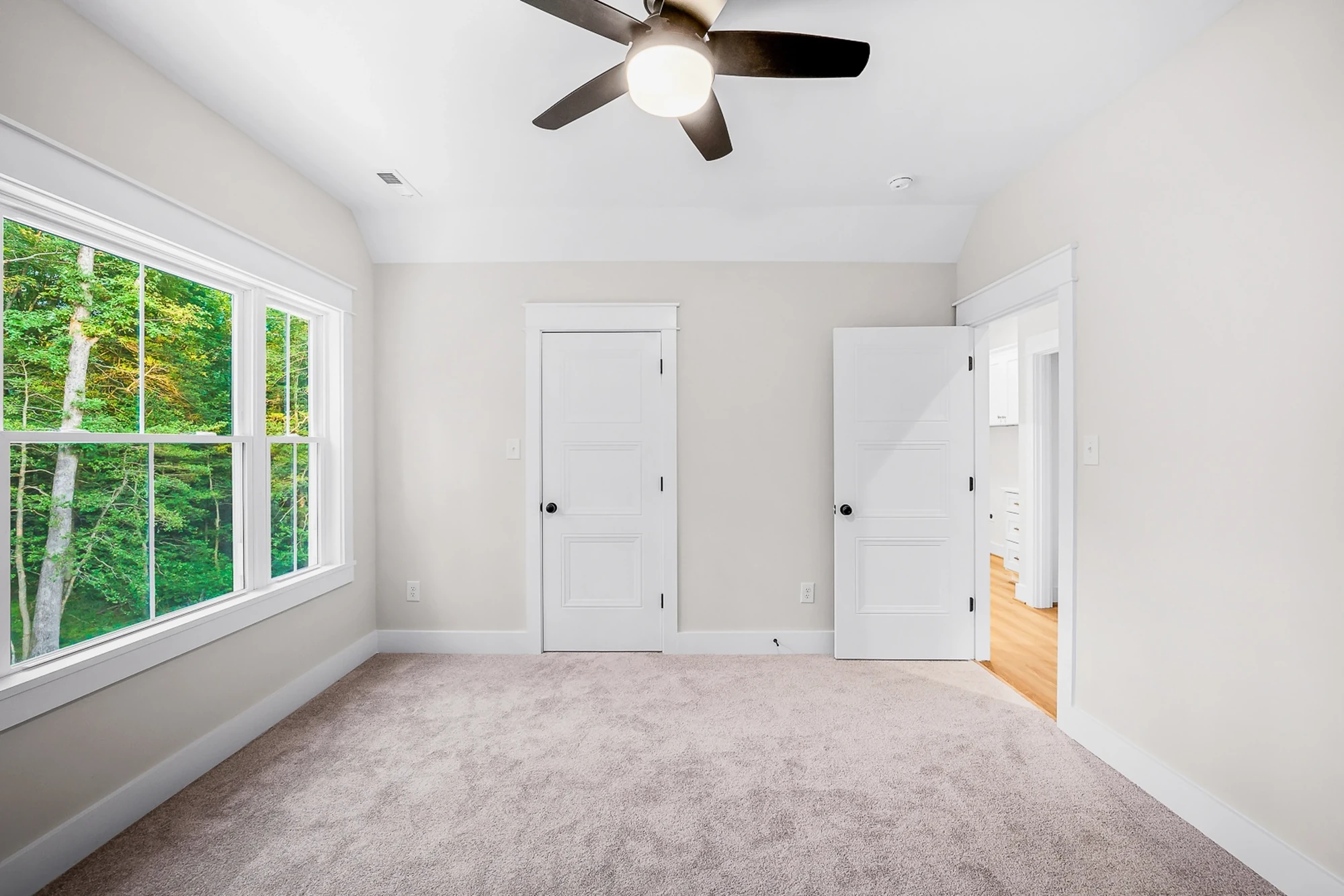 Bedroom with double closets