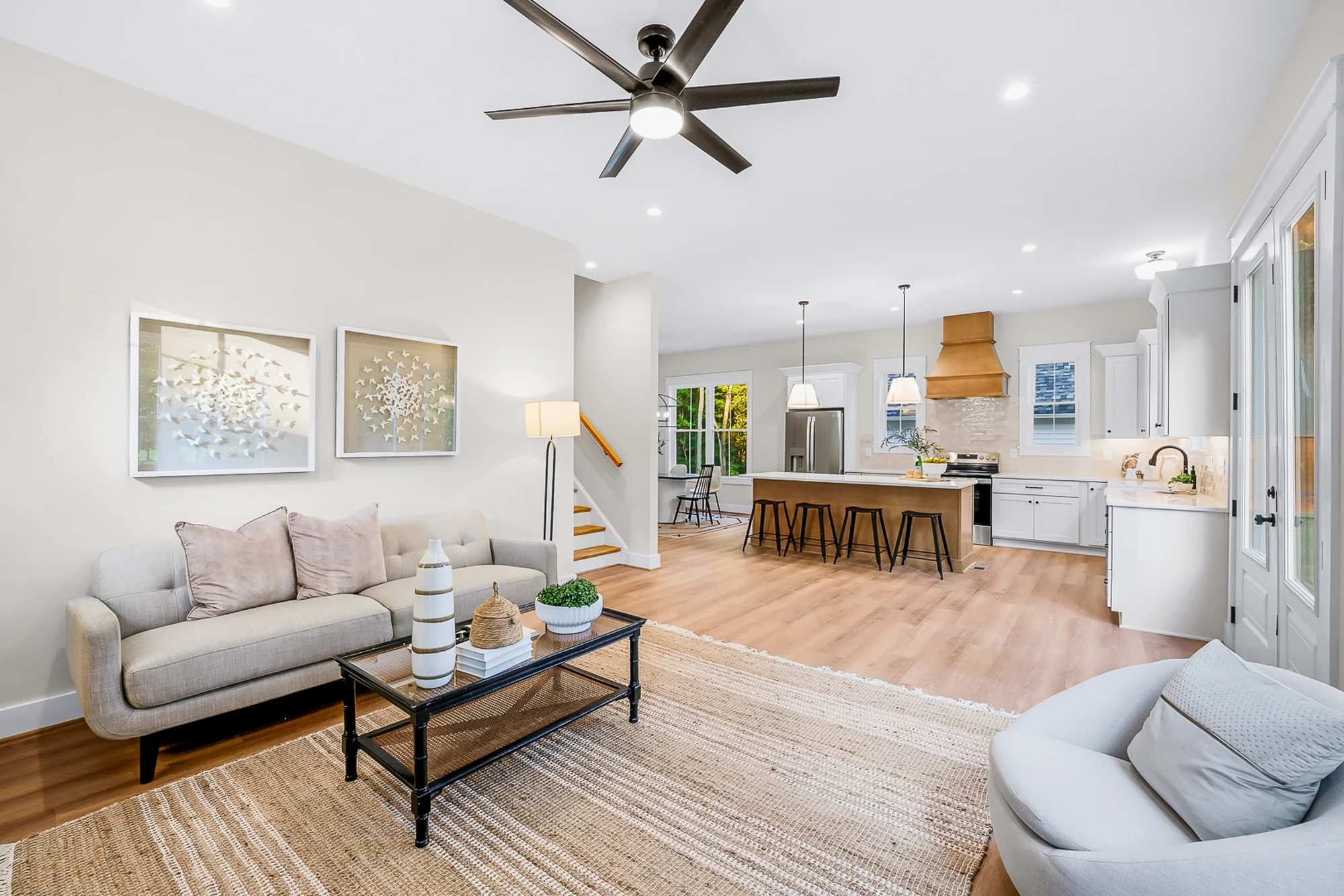 Living room with staircase and open floor plan