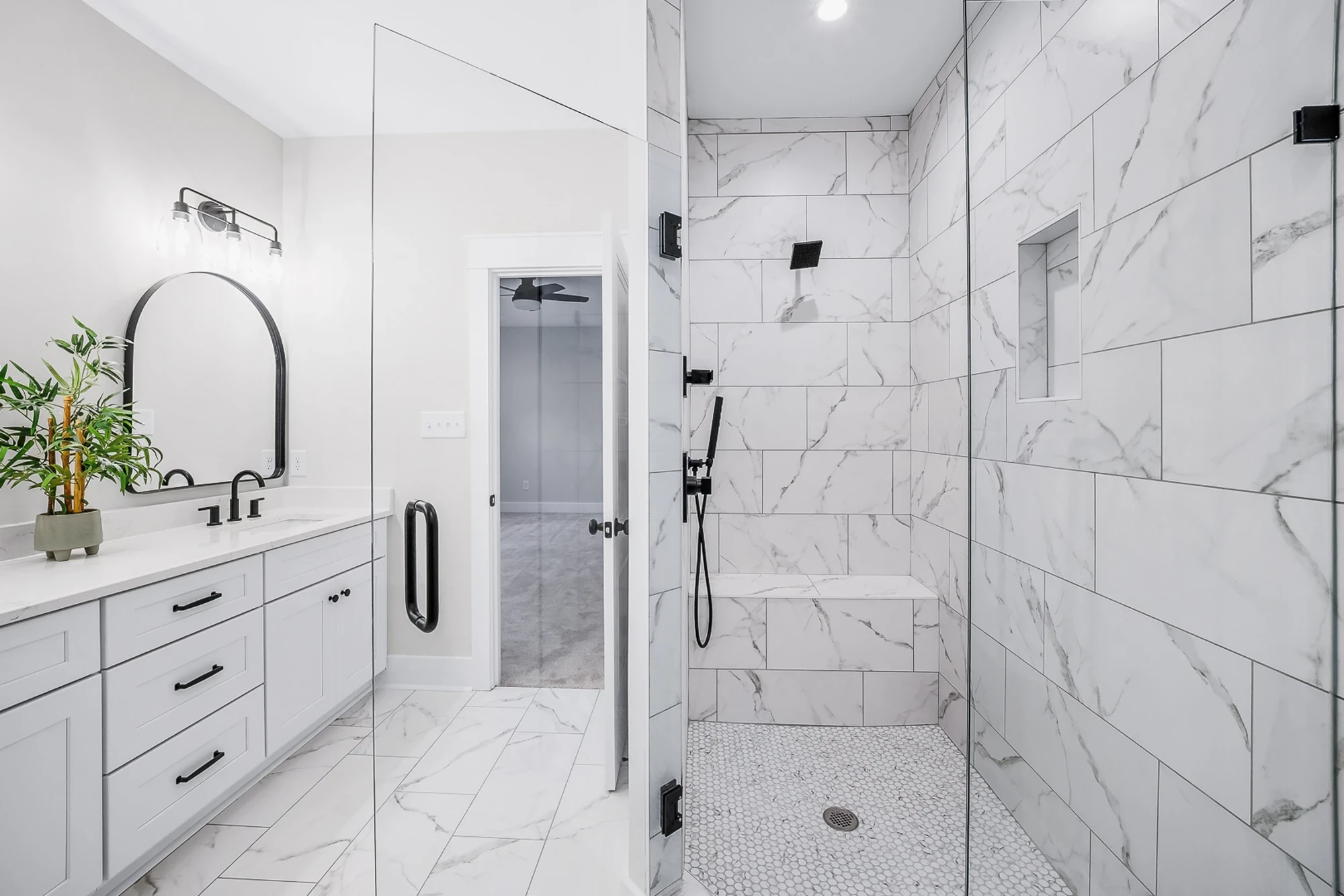 Primary bathroom — marble walk-in shower