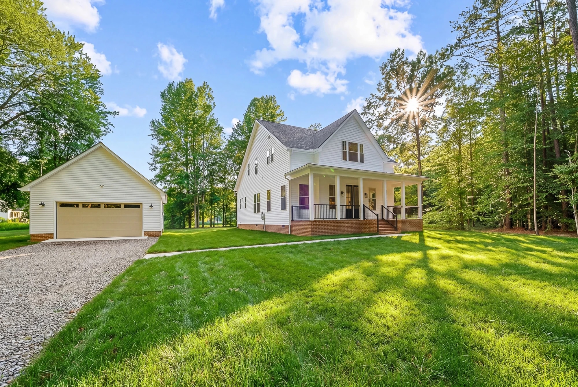 Custom farmhouse build — front lawn at golden hour
